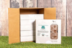 Mackerel & Vegetable Formula Raw Dog Food package on grass background.