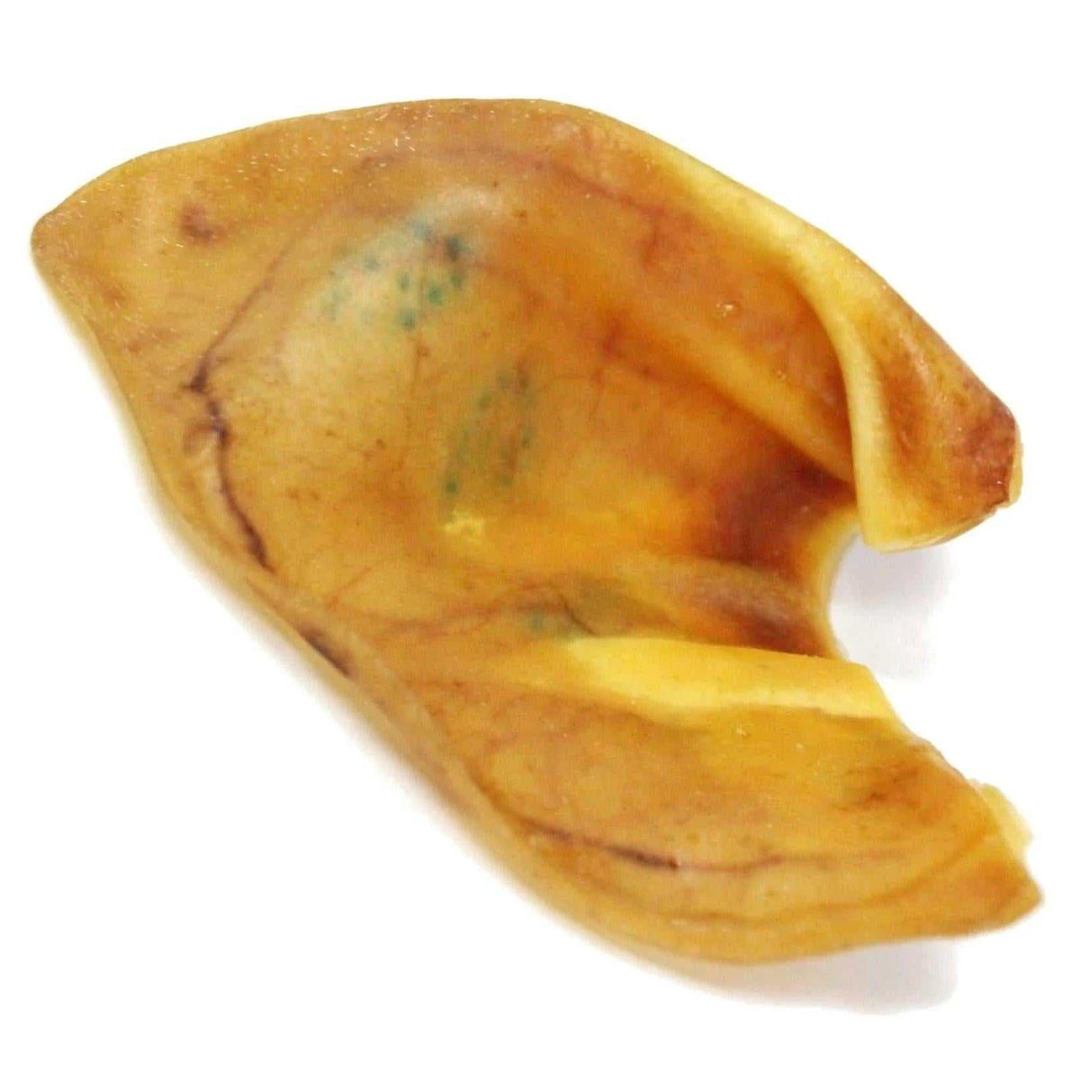 Pig Ear dog chew made from golden-brown baked material, with a natural curved shape and ridged texture.