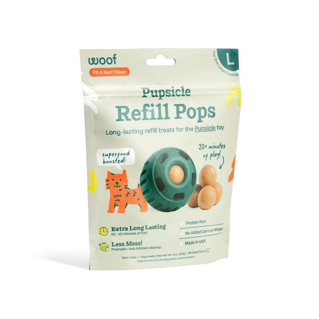 Pupsicle Pops refill treats in a pale green and cream pouch, featuring teal lettering, orange accents, and a toy illustration.