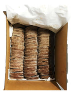 Rabbit Duck raw dog food pucks, brown ground meat with visible white flecks, stacked in columns inside a box.