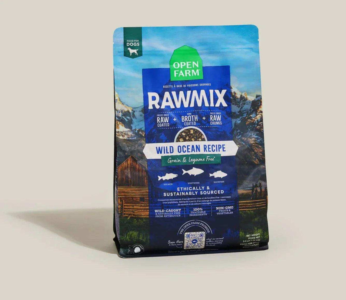 Dog kibble in a blue bag, featuring the RawMix Wild Ocean recipe with bold white lettering and mountain artwork.