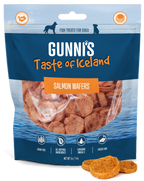 Gunni's Salmon Recipe Wafers dog treats in blue resealable bag, orange-brown thin fish wafers, grain-free and omega-3 rich.