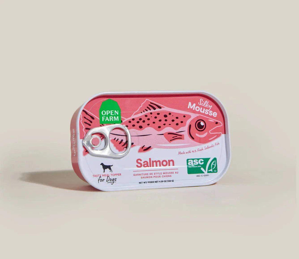 Salmon Topper for Dogs in a pink and white aluminum can with a pull-tab lid and illustrated salmon graphic