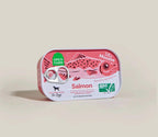 Salmon Topper for Dogs in a pink and white aluminum can with a pull-tab lid and illustrated salmon graphic