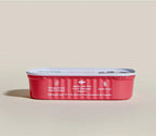 Salmon Topper for Dogs in a red metal pull-tab tray with white lid and printed product details.