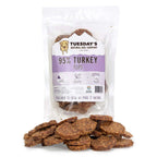 Turkey Flips dog treats, brown irregularly shaped pieces with a rough, textured appearance in a clear resealable bag.