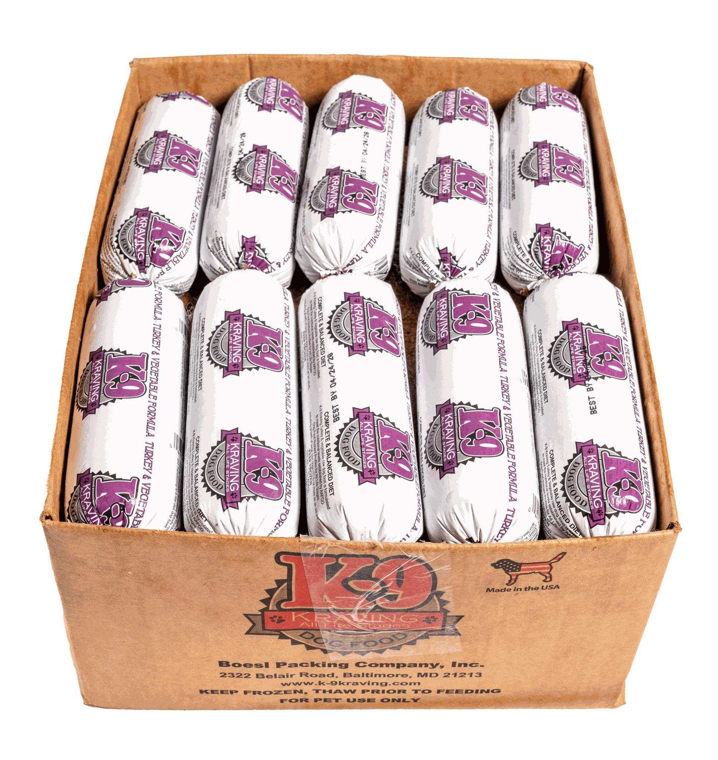 Raw dog food rolls in a box, labeled K-9 Kraving Turkey & Vegetable Formula.