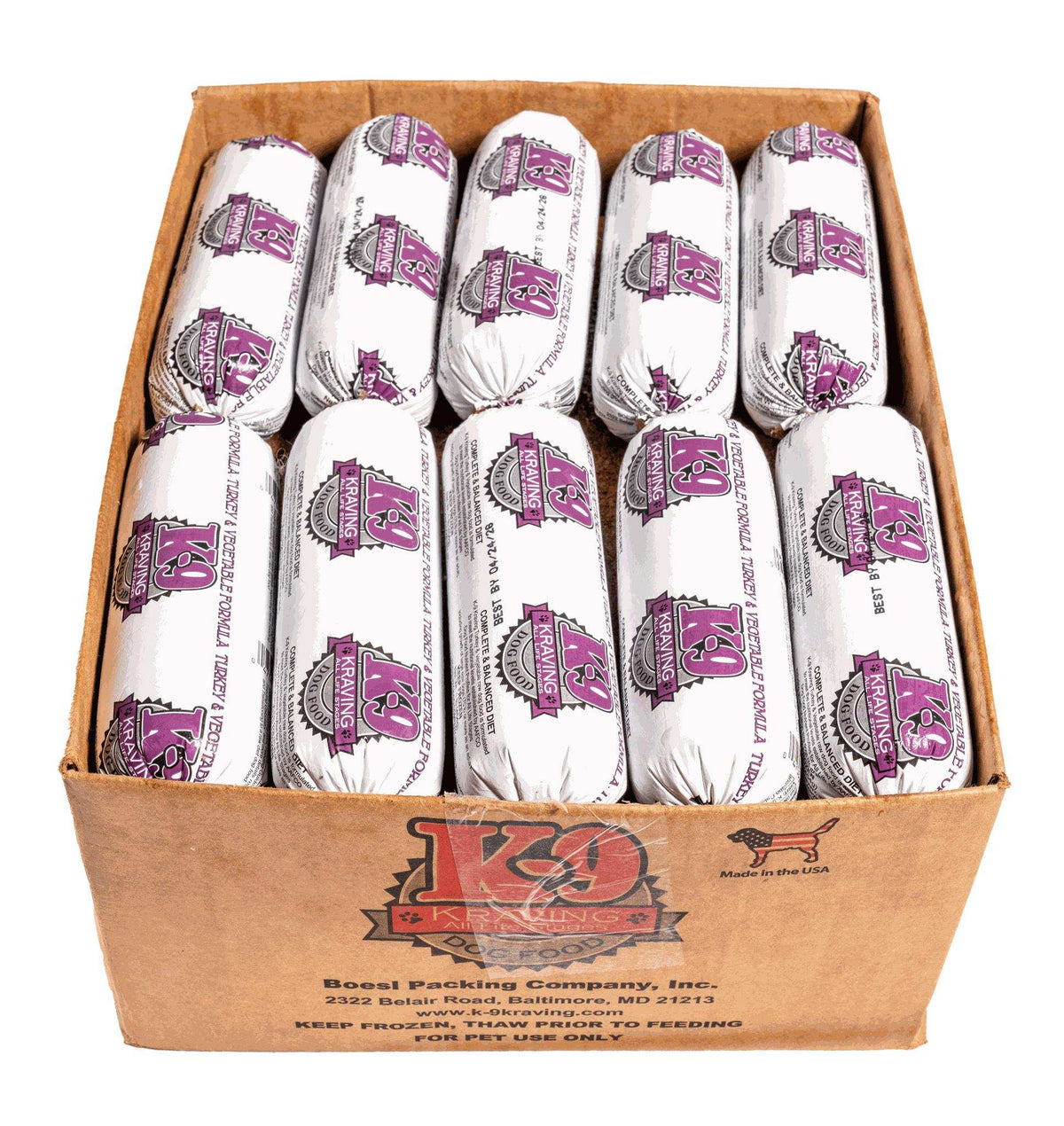 Turkey raw dog food in white plastic-wrapped rolls with purple labels, packed in a brown cardboard box.
