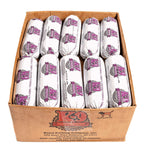 Turkey raw dog food in white plastic-wrapped rolls with purple labels, packed in a brown cardboard box.
