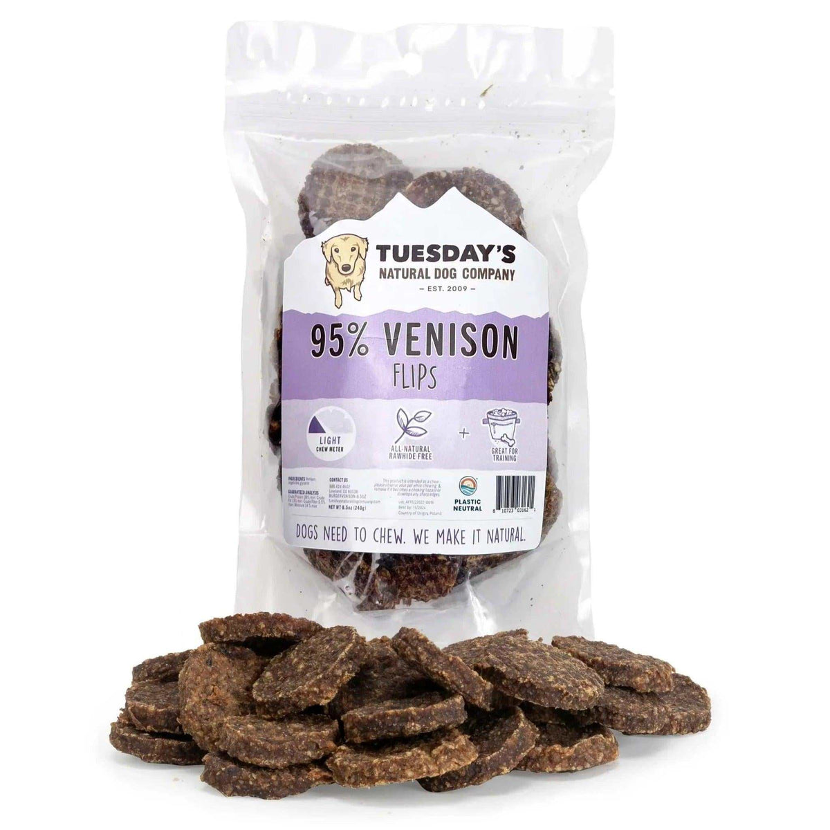 Venison Flips are brown, flat, irregularly round dog treats with a coarse, speckled texture.