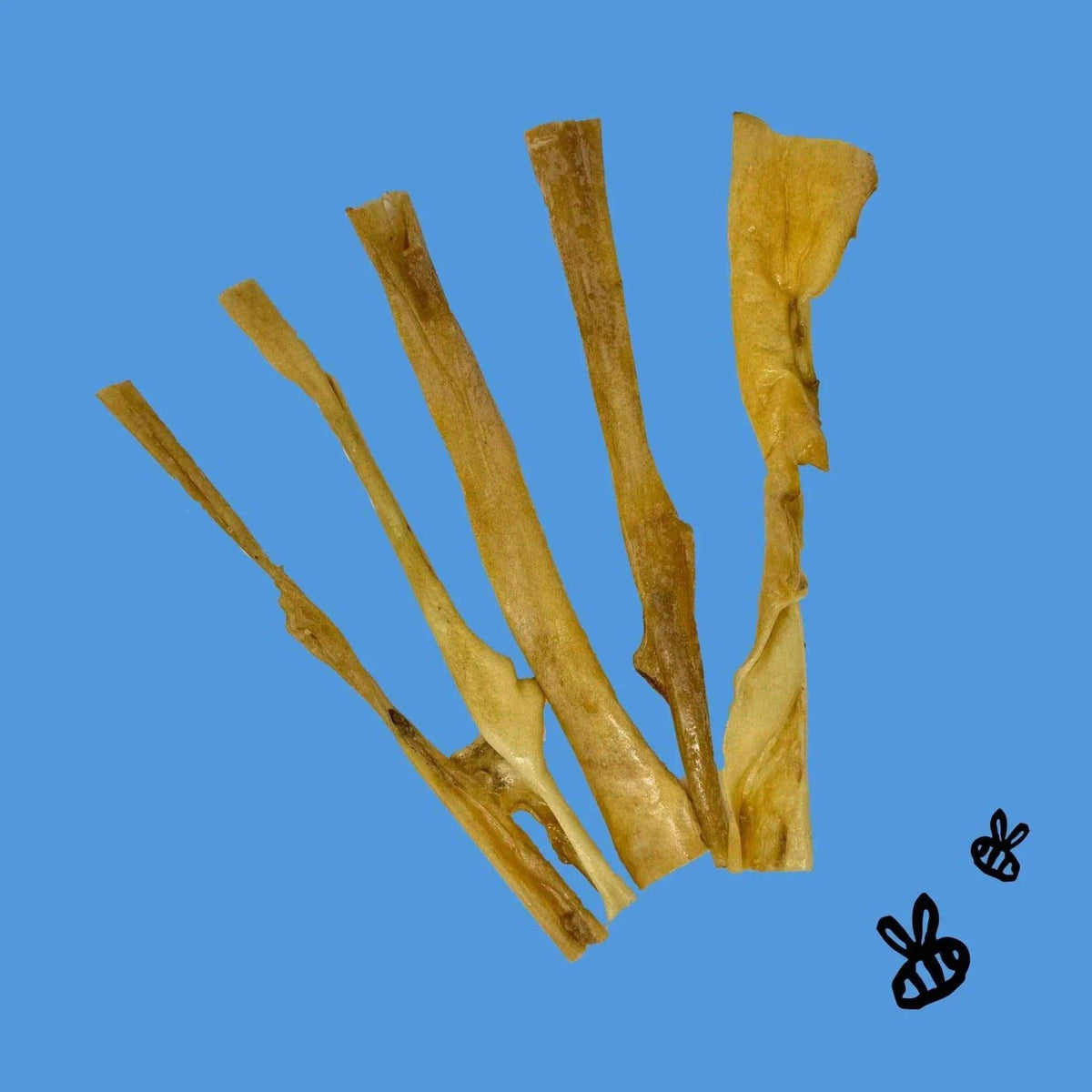 Water Buffalo Collagen Strips for dogs, tan natural hide with a leathery texture, cut into long uneven strips.